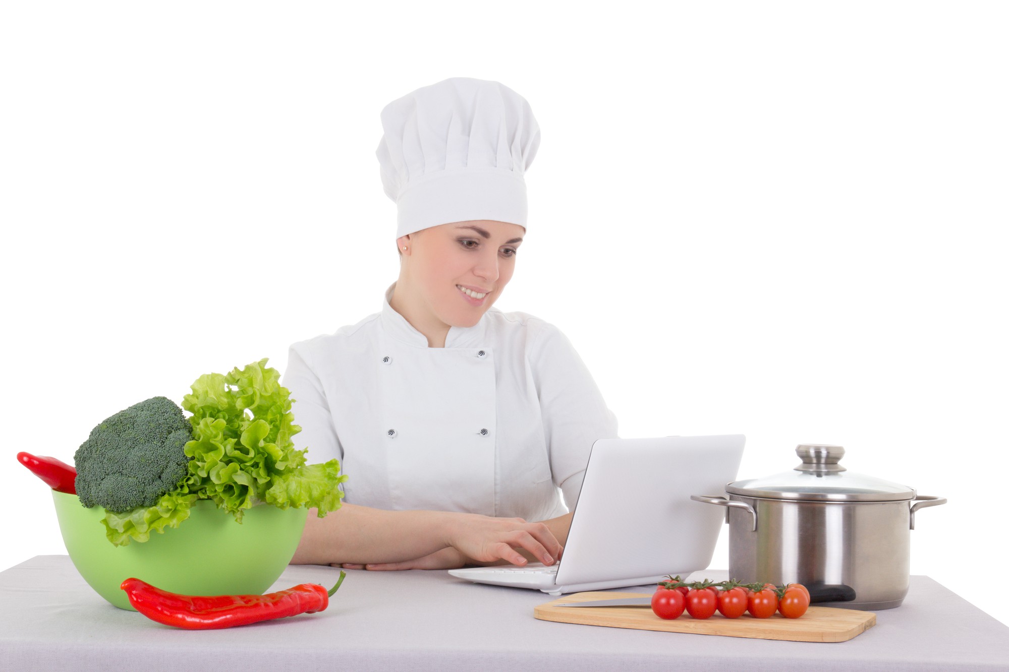Chef teaching a small group in a home kitchen